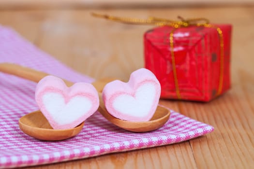 candies sweets heart in bottle on table