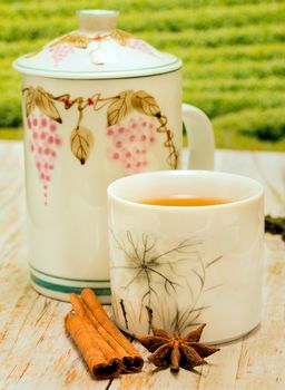 Tea With Cinnamon Showing Spices Refreshed And Teacups