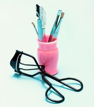 Cosmetic Makeup Tools Showing Eyelash Curlers And Tweeze