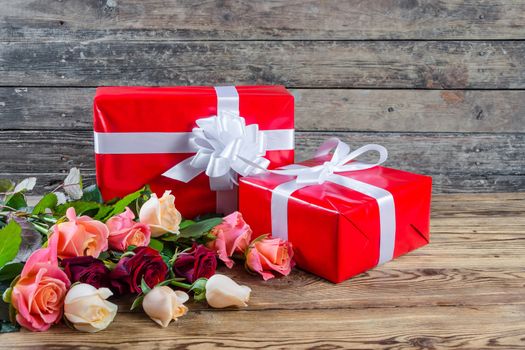 Roses and gift box, rustic style