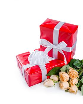 Beautiful rose flowers with gift box isolated on white background