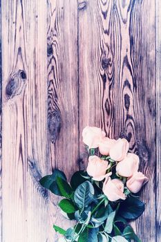 Vintage Roses on rustic wooden table