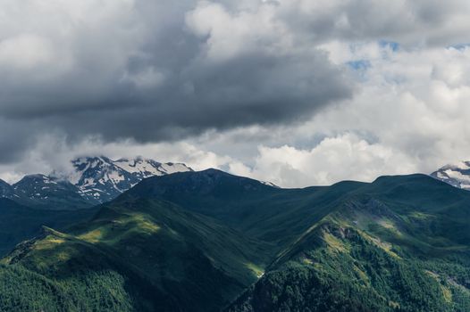 Mountains and hills lit by the sun