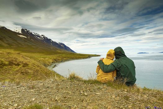 A couple contemplating the beautiful landscape