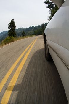 Dirty car driving out in the middle of nowhere