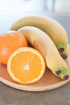 Healthy fruits with oranges and bananas, stock photo