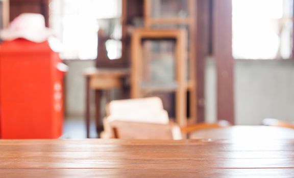 Empty wooden table in coffee shop, stock photo