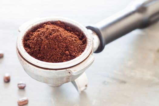 Coffee grind in group with coffee bean, stock photo