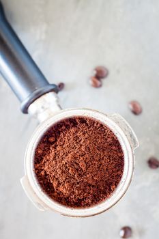 Coffee grind in group with coffee bean, stock photo