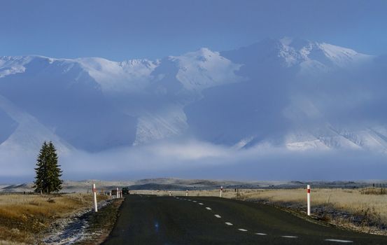 Landscape with a road and mountains in New Zealand