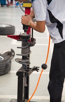 Engineers are repairing shock absorber.