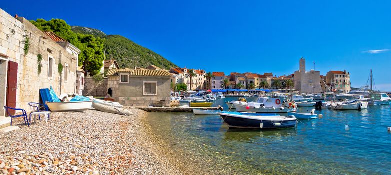 Komiza on Vis island beach and town panoramic view, Dalmatia, Croatia