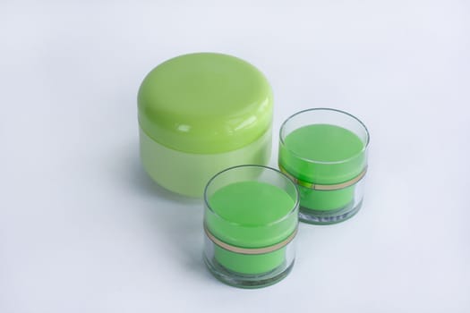 Cosmetic set of three cream bottles