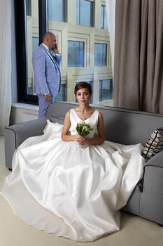 Charming bride and groom in their house