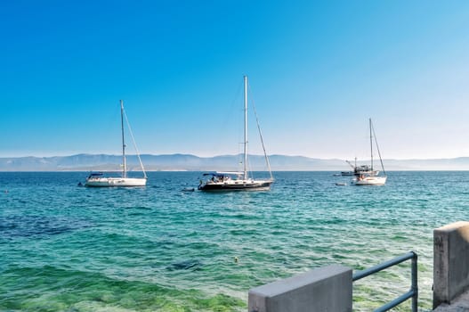 Three sail yachts in Mediterranean sea