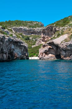 Sea view to small lagoon beach on mountains island