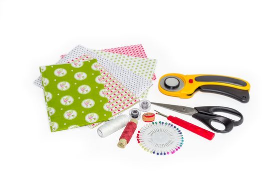 Composition of instruments, items and fabrics for quilting