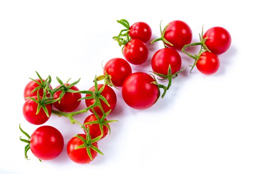 Bunch of tomatoes on white background