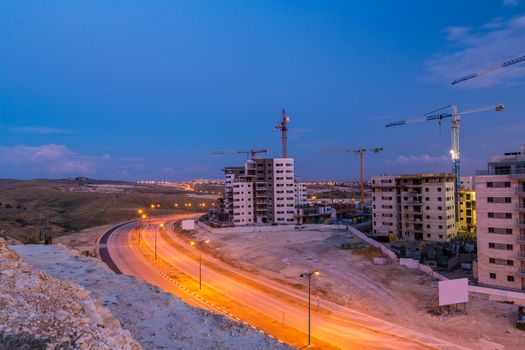construction of the city on sunset background