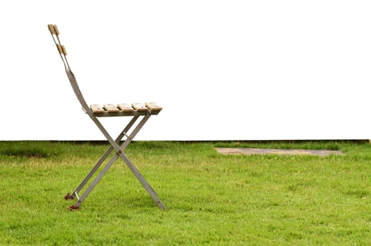 Old chair on green grass on white background





Old chair on green grass