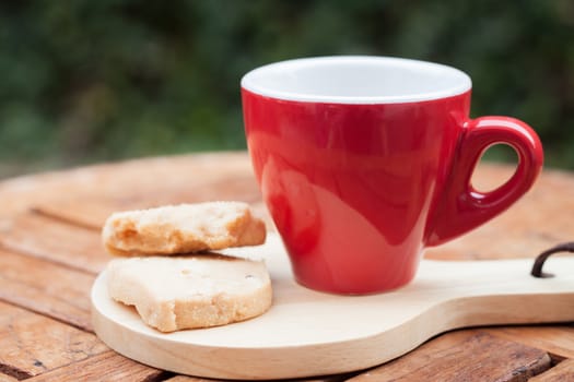 Cashew cookies with coffee cup, stock photo