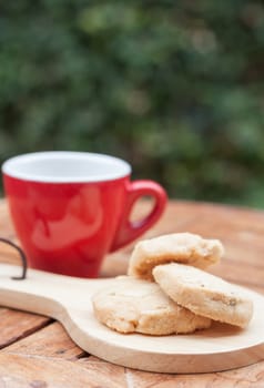 Cashew cookies with coffee cup, stock photo