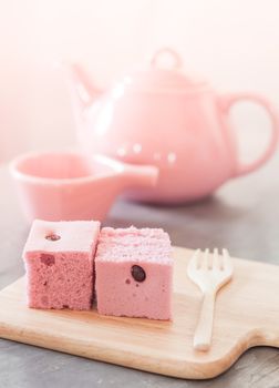 Steamed cake on wooden plate, stock photo