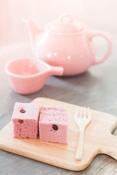 Steamed cake on wooden plate, stock photo