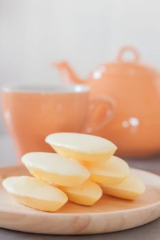 Traditional Thai cookies on wooden plate, stock photo