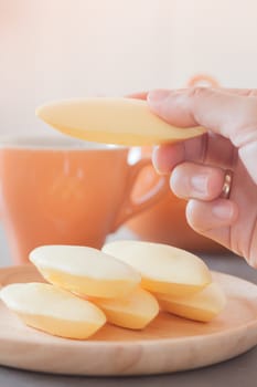 Woman's hand holding traditional Thai cookies , stock photo