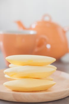 Traditional Thai cookies on wooden plate, stock photo