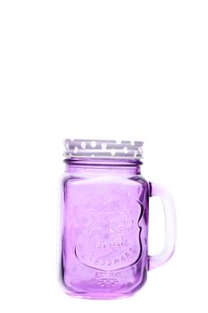 Violet mason glass on white background, stock photo