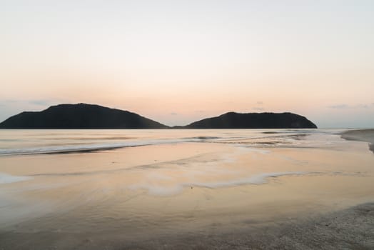 Summer view of the sea and mountain range.