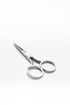 Medical scissors equipment on white background, stock photo