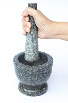 Stone mortar and pestle on white background, stock photo