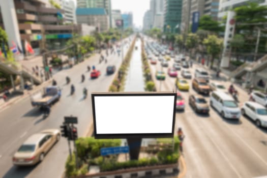 Blank billboard on road/effect blurred background