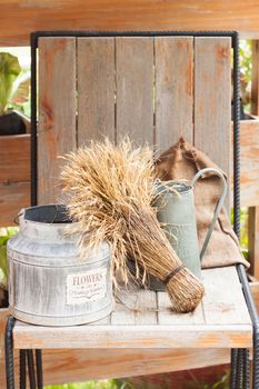 Outdoor vintage chair with garden ornament, stock photo