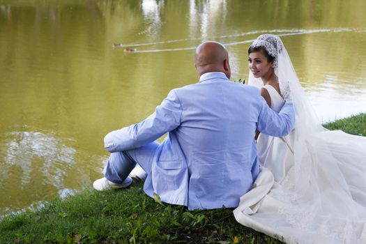 The groom and the bride in park