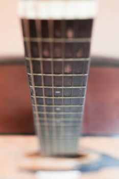 Close up acoustic guitar detail, stock photo