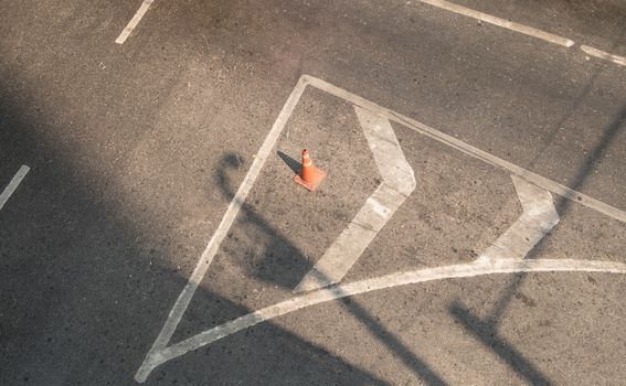 Orange funnel on the road sign drive be careful.