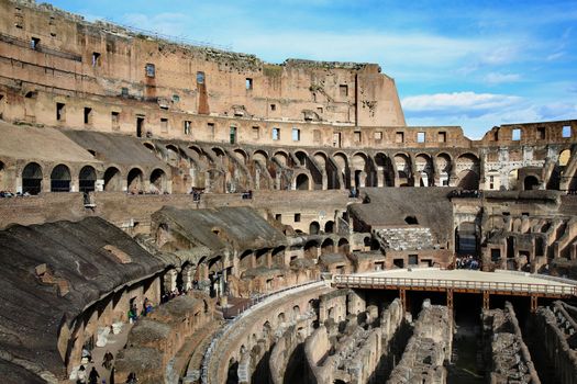 ROME; ITALY - APRIL 08: Ruins of the Colloseum and tourists in Rome; Italy. Rome is the capital of Italy and region of Lazio. Italy on April 08; 2015.