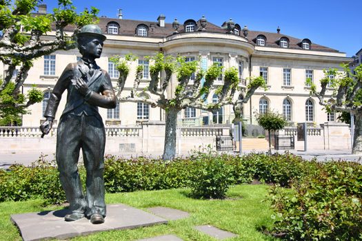 VEVEY, SWITZERLAND - 24 MAY: Bronze statue of comedian actor Charlie Chaplin on the promenade in Vevey (Vaud), Switzerland on May 24,2010.