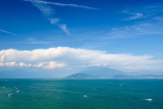 High mountains on other coast of Garda lake, Desenzano, italy