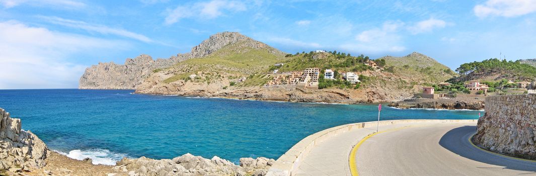 Curve panorama - bay Cala Molins in Cala Sant Vicenc, Majorca, Spain - mountains with ocean view