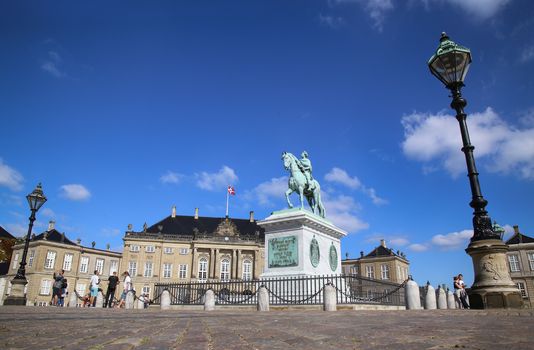 COPENHAGEN, DENMARK - AUGUST 15, 2016: Sculpture of Frederik V on Horseback in Amalienborg Square, it's home of the Danish Royal family in Copenhagen, Denmark on August 15, 2016.