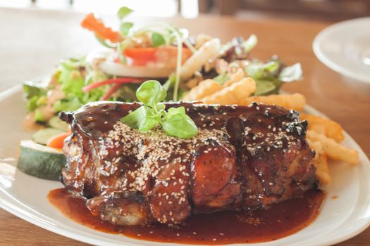 Grilled pork ribs with spicy sauce, stock photo