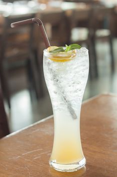 Glass of iced honey lemon soda, stock photo