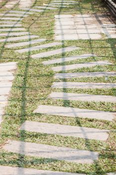 Garden stone path with grass, stock photo