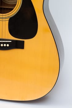 Acoustic guitar on white background, stock photo