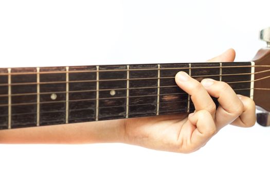 Woman's hands playing acoustic guitar, stock photo